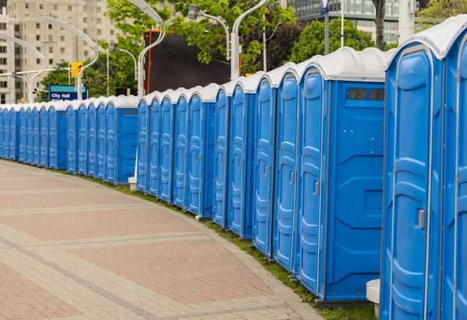 a row of portable restrooms at a fairground, offering visitors a clean and hassle-free experience in Addison, TX